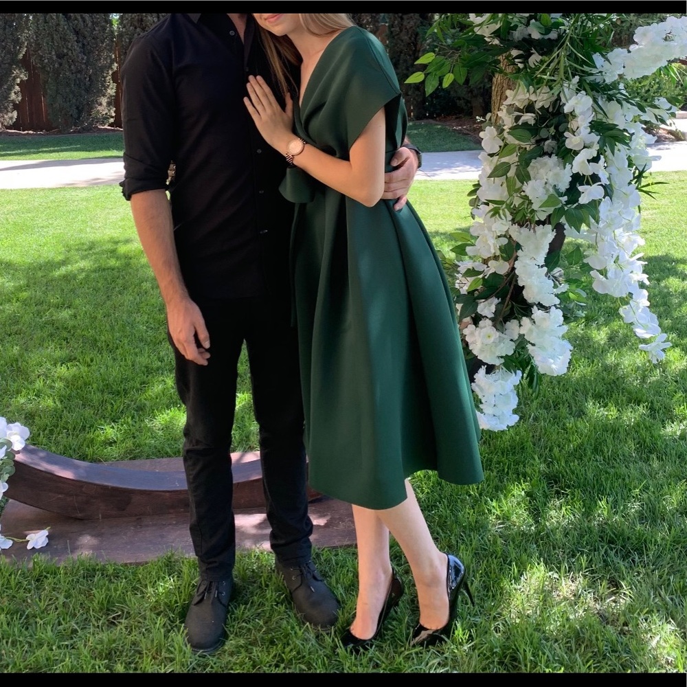 Gorgeous emerald green dress.